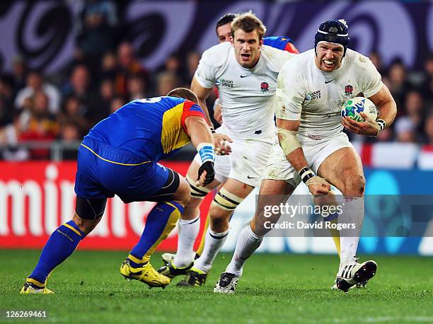 James Haskell of England runs the ball during the IRB 2011 Rugby World Cup Pool B match between England and Romania at Otago Stadium on September 24,...