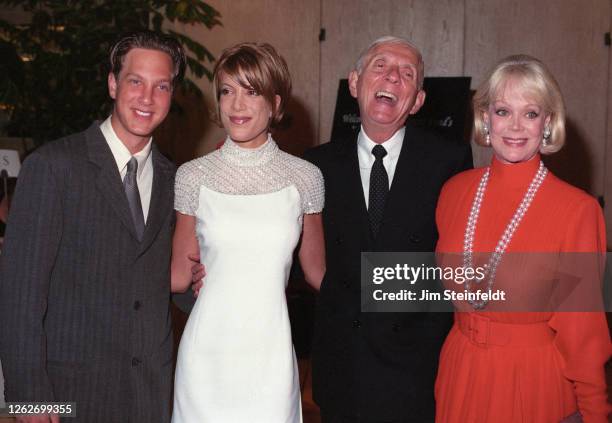 Aaron Spelling and family pose for a portrait in Los Angeles, California in 1997.