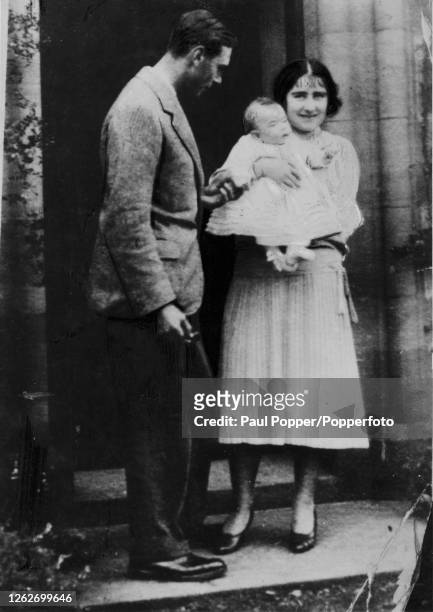 Prince Albert, Duke of York , later George VI, and Elizabeth, Duchess of York , later Queen Elizabeth The Queen Mother, posed with their baby...