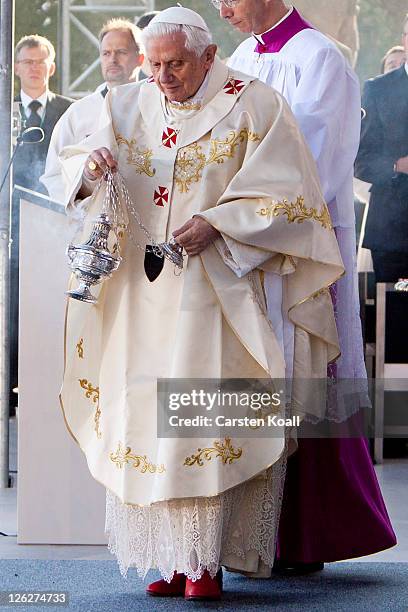 Pope Benedict XVI leads a morning mass at Domplatz square in front of the Erfurter Dom cathedral on September 24, 2011 in Erfurt, Germany. The Pope...