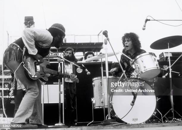 Still from Michael Wadleigh's documentary, ‘Woodstock’, showing bassist David Brown and drummer Michael Shrieve performing with Santana at the...