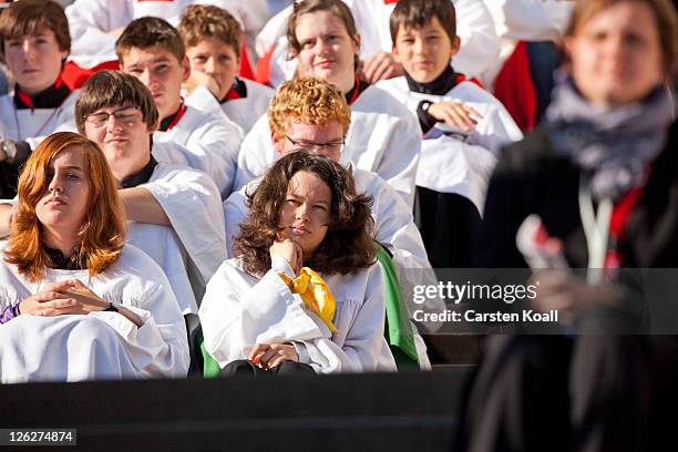 Acolytes attend a morning mass led by Pope Benedict XVI at Domplatz square in front of the Erfurter Dom cathedral on September 24, 2011 in Erfurt,...