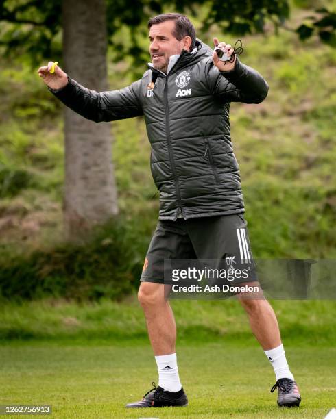 Coach Dave Kelly of Manchester United U18s in action during a training session at Aon Training Complex on July 29, 2020 in Manchester, England.