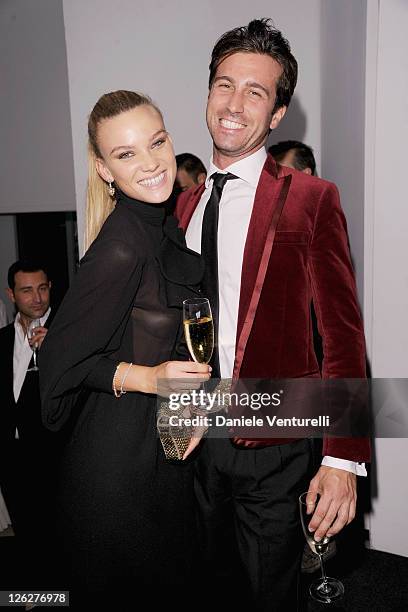 Carlo Mazzoni and Fiammetta Cicogna attend amfAR MILANO 2011 at La Permanente on September 23, 2011 in Milan, Italy.