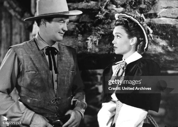 Kino. Schmutzige Dollars, Wyoming Kid, Schmutzige Dollars, Wyoming Kid, Dennis Morgan, Jane Wyman Der Spieler James Wylie verfolgt einen Betrueger....