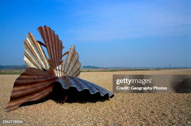 Scallop shell sculpture by Maggi Hambling on the beach, Aldeburgh, Suffolk, England, UK.