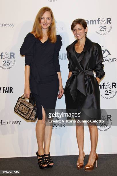 Cynthia Leive and guest attend amfAR MILANO 2011 at La Permanente on September 23, 2011 in Milan, Italy.