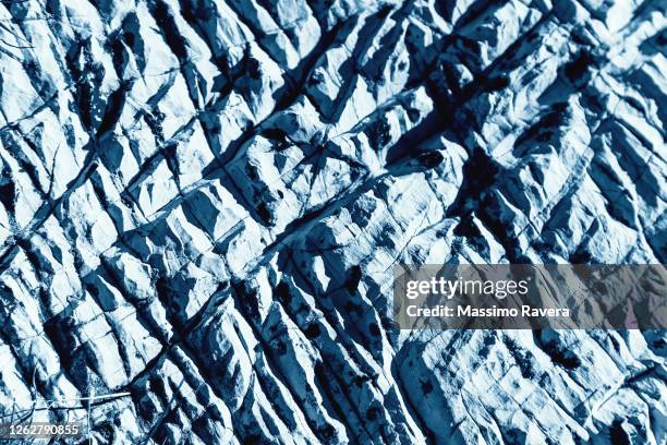 blue stone texture - grooved stock-fotos und bilder