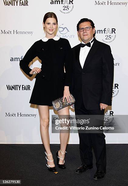 Anais Pouliot and guest attend amfAR MILANO 2011 at La Permanente on September 23, 2011 in Milan, Italy.