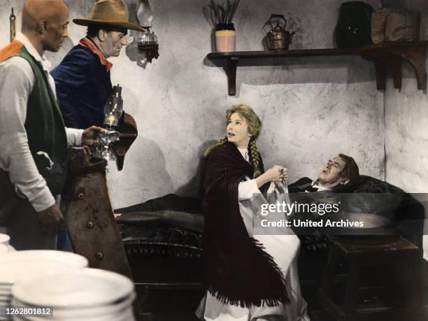 Kino. Der Mann, der Liberty Valance erschoß, USA Regie: John Ford, WOODY STRODE, JOHN WAYNE, VERA MILES, JAMES STEWART.