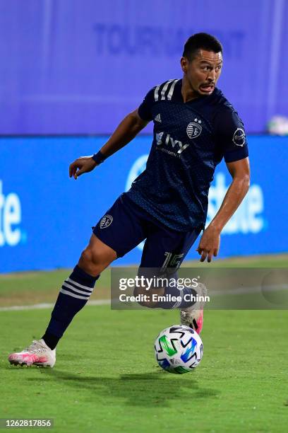 Roger Espinoza of Sporting Kansas City controls the ball during a quarter final match of MLS Is Back Tournament between Philadelphia Union and...