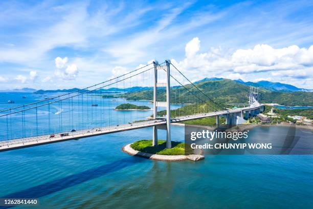 drone view of tsing ma bridge, hong kong - hong kong international airport stock pictures, royalty-free photos & images