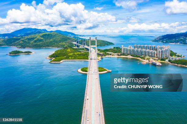 drone view of tsing ma bridge, hong kong - lantau stock pictures, royalty-free photos & images