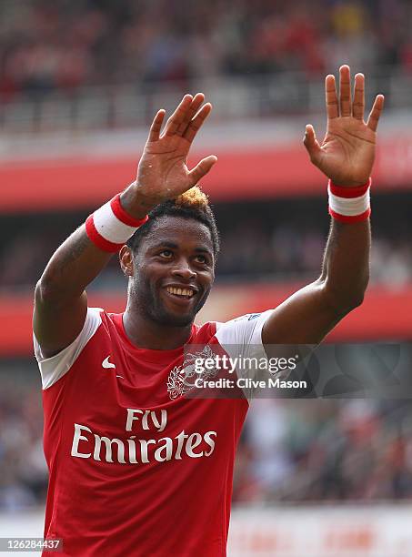 Alex Song of Arsenal celebrates his goal with team mate Bacary Sagna during the Barclays Premier League match between Arsenal and Bolton Wanderers at...