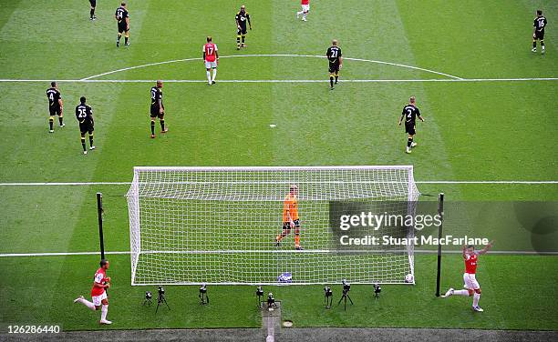 Robin van Persie of Arsenal celebrates scoring his 2nd goal of the match and his 100th goal for Arsenal during the Barclays Premier League match...