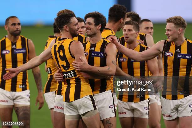 Jack Gunston and Ben Stratton of the Hawks celebrate after winning the round nine AFL match between the Carlton Blues and the Hawthorn Hawks at Optus...