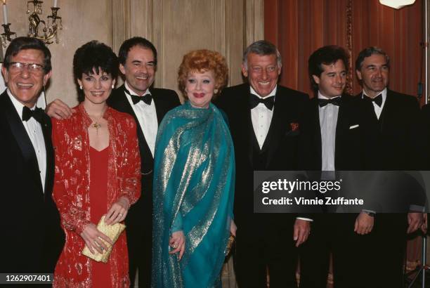 American actress and comedian Lucille Ball with her family during a tribute to her by the Museum of Broadcasting in New York City, April 1984. From...