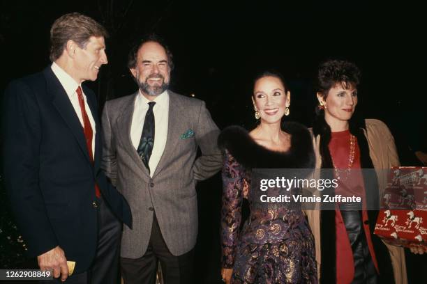 From left to right, American politician Gary Hart with actors Laurence Luckinbill, Mary Ann Mobley and Lucie Arnaz, circa 1985. Luckinbill and Arnaz...