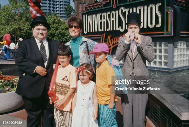 American actress and singer Lucie Arnaz with her children and a pair of Laurel and Hardy impersonators at Universal Studios Hollywood in Los Angeles...