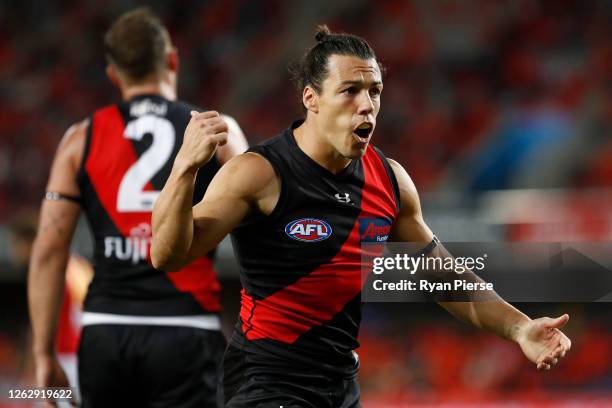 Dylan Shiel of the Bombers yells instructions during the round nine AFL match between the Essendon Bombers and the Brisbane Lions at Metricon Stadium...