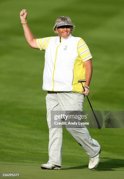 Laura Davies of Europe celebrates victory on the 15th hole during the afternoon fourballs on day two of the 2011 Solheim Cup at Killeen Castle Golf...