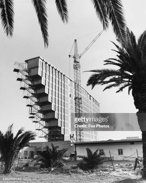 The Hotel du Lac under construction in Tunis, Tunisia, 10th March 1972. It is shaped like an inverted pyramid and is being built in the Brutalist...