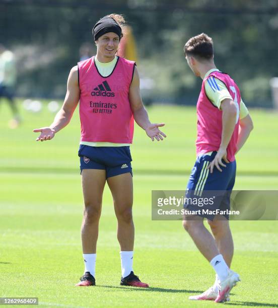 David Luiz and Kieran Tierney of Arsenal during a training session at London Colney on July 31, 2020 in St Albans, England.