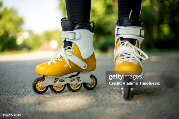 rollerblades - inline skate stock pictures, royalty-free photos & images