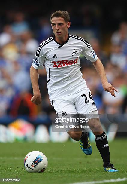 Joe Allen of Swansea City in action during the Barclays Premier League match between Chelsea and Swansea City at Stamford Bridge on September 24,...