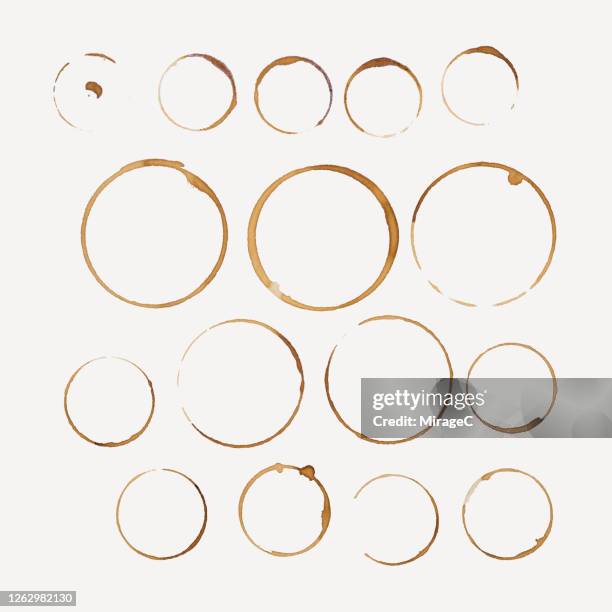 coffee cup stains collection on beige - coffee spill stock pictures, royalty-free photos & images