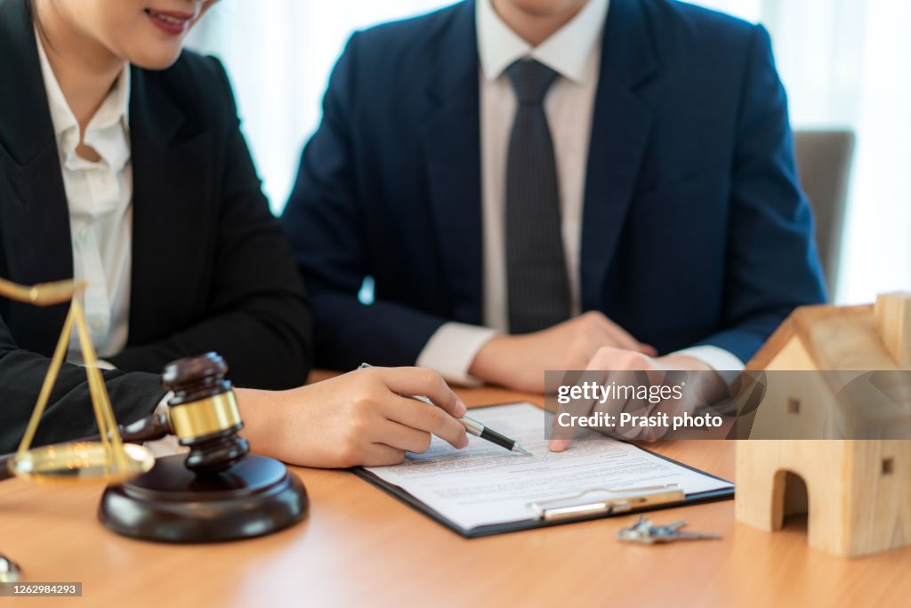 Customer service good cooperation, Consultation between a Businessman and Male lawyer or judge consult having team meeting with client, Law and Legal services concept.