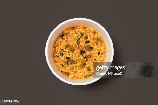 prepared instant noodles in a paper bowl - instant noodles stock pictures, royalty-free photos & images