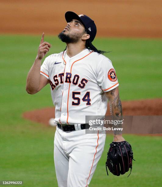 Roberto Osuna of the Houston Astros walks off the mound after pitching against the Los Angeles Dodgers at Minute Maid Park on July 29, 2020 in...