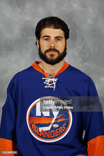 Rick DiPietro of the New York Islanders poses for his official headshot for the 2011-2012 season on September 16, 2011 at the Nassau Coliseum in...