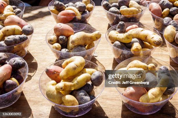 Florida, Orlando, Farmers' Market, produce stand, fingerling potatoes in clear plastic bowls.