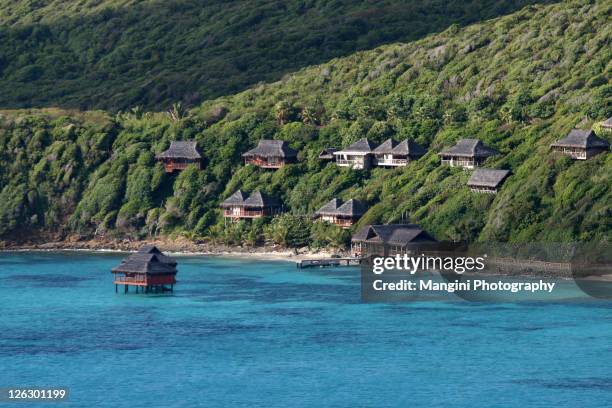 bungalows at canouan - grenadines stock pictures, royalty-free photos & images