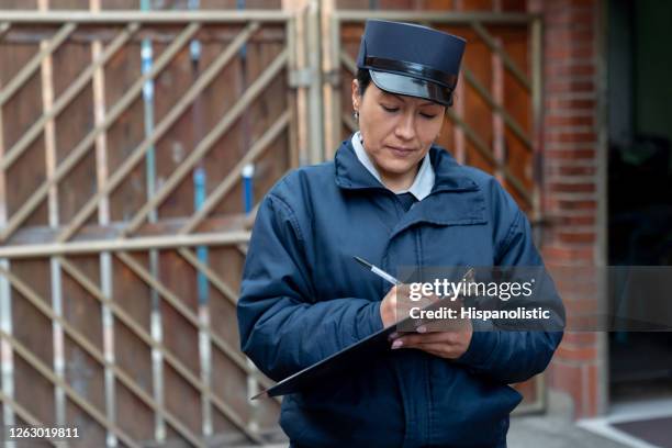 security guard working at a gated community - defending stock pictures, royalty-free photos & images