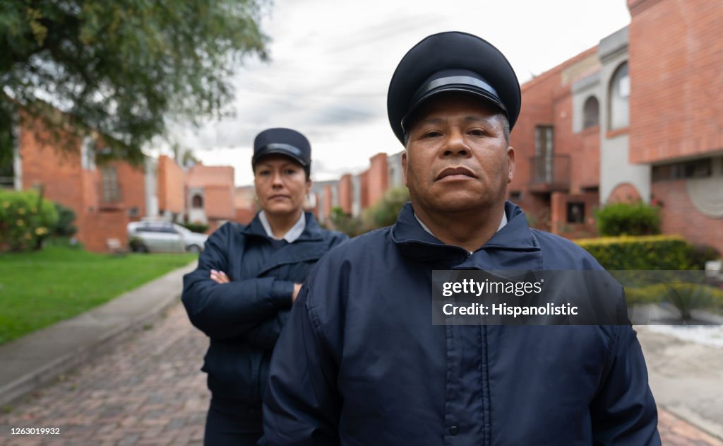 Security guards looking very serious at work