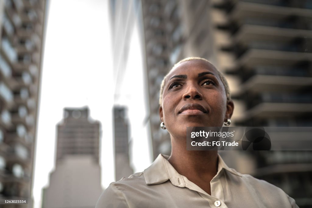 Businesswoman loking away outdoors