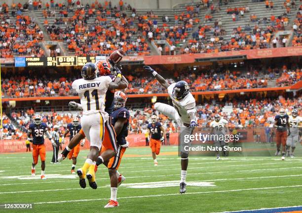 Kevyn Scott of the Syracuse Orange with an interception intended for Toledo Rockets' player Bernard Reedy in overtime during the game on September...