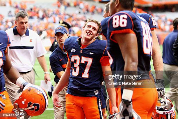 Ross Krautman the kicker for the Syracuse Orange with the game winning overtime kick against the Toledo Rockets during the game on September 24, 2011...