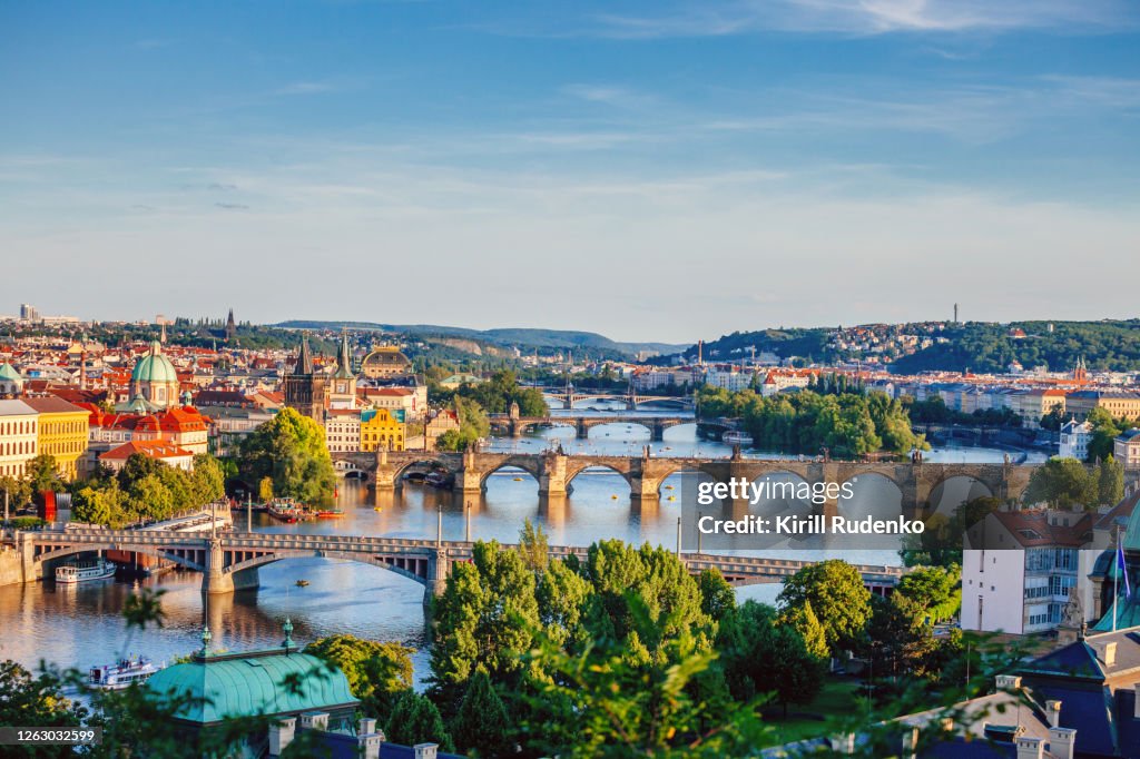 Panoramic view of Prague's Old Town, Vltava River and Bridges at Sunset