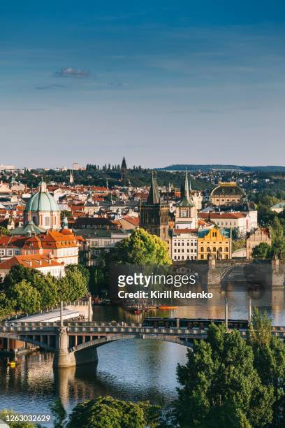 aerial view of prague's old town and bridges across vltava river - vltava river stockfoto's en -beelden