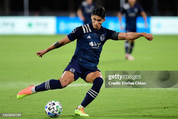 Alan Pulido of Sporting Kansas City takes a shot on goal during a quarterfinals match against Philadelphia Union during the MLS Is Back Tournament at...