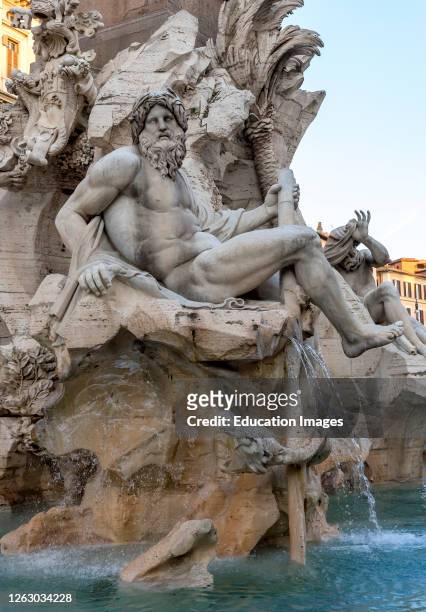 Sculpture representing River Ganges at Fountain of the four Rivers, Fontana dei Quattro Fiumi, Piazza Navona, Rome, Italy.