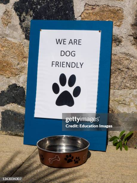 We are dog friendly sign at the Charlestown Harbor museum, Cornwall, UK .