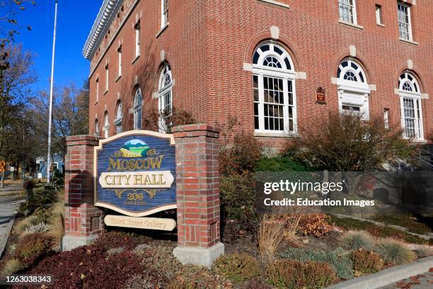 City Hall in Moscow Idaho showing its red brick building and entrance sign.