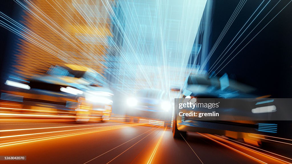 Generic speeding cars in futuristic city