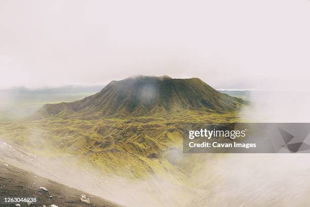 marumligar volcano with mist, vanuatu - vanuatu stock pictures, royalty-free photos & images