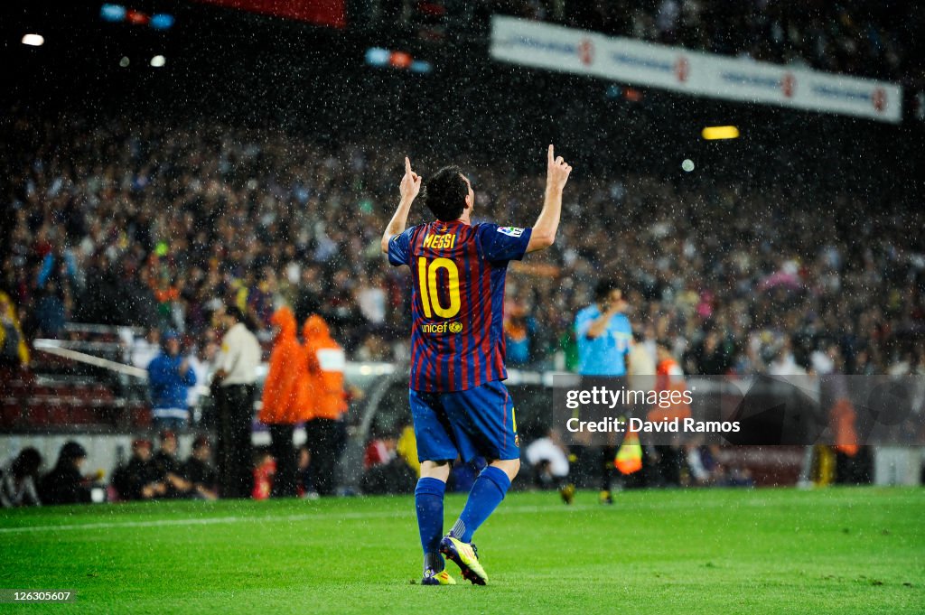 Lionel Messi of FC Barcelona celebrates after scoring his third... News